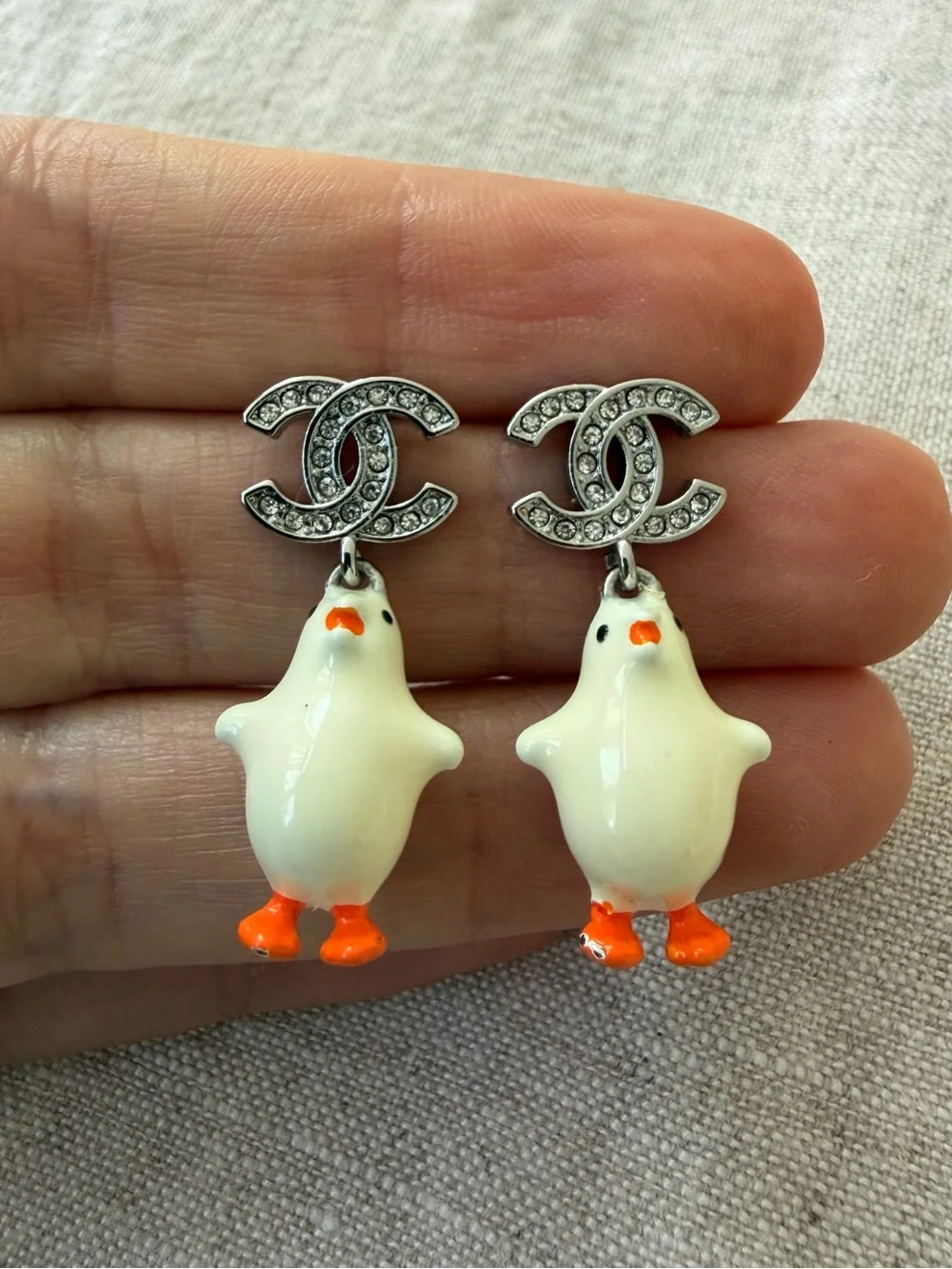 CHANEL White Enamel Chicken CC Drop Earrings with Orange Accents